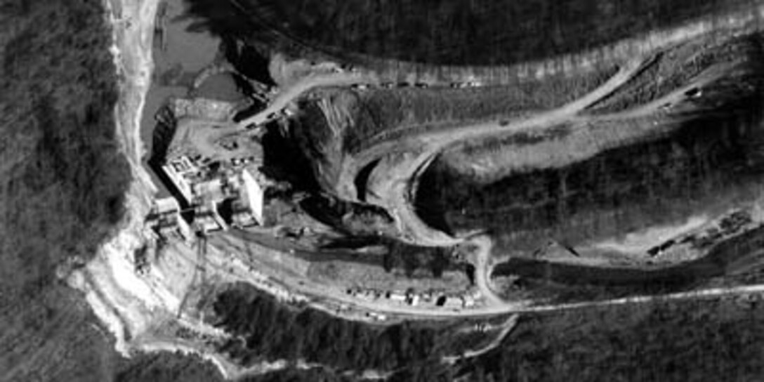 Martins Fork Lake Dam construction seen from above in black and white