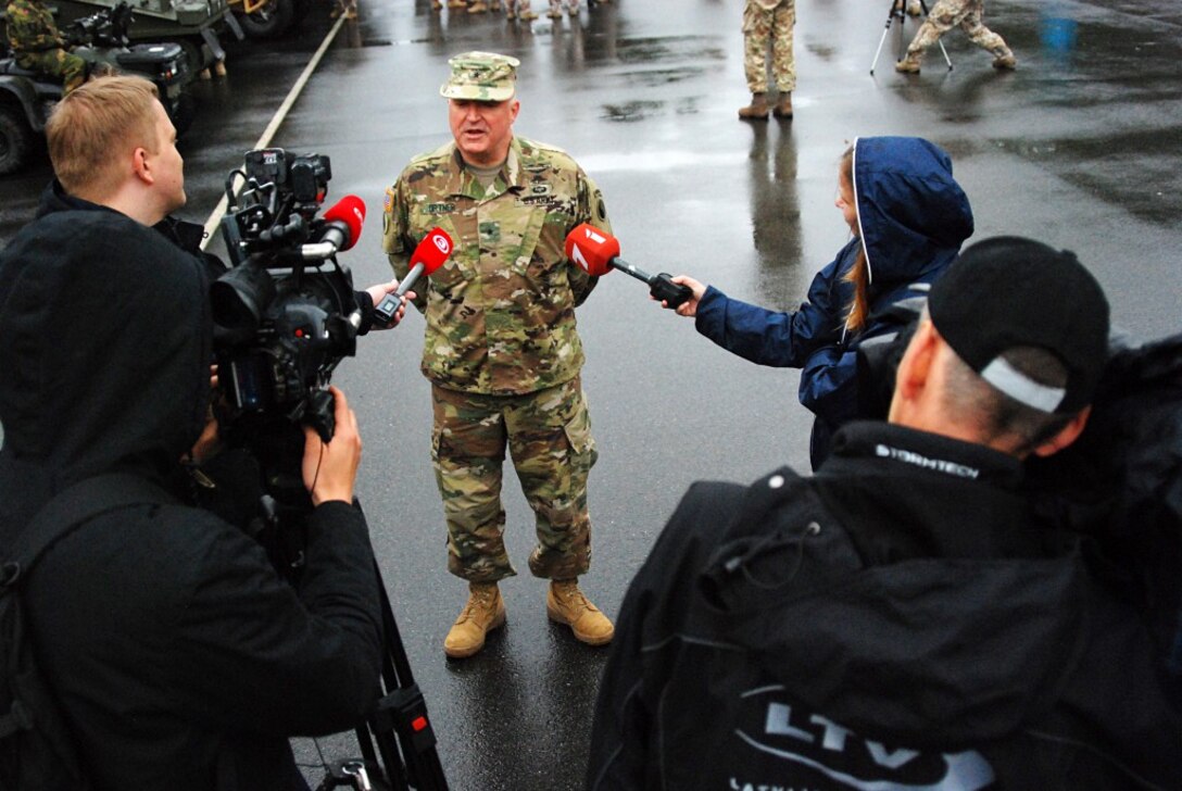 Brig. Gen. Blake C. Ortner, commanding general of the Virginia National Guard’s 29th Infantry Division and exercise director of Saber Strike 16, speaks with Latvian media following the opening ceremony of Saber Strike 16 June 11, 2016, at Adazi Military Base, Latvia. (Photo by Master Sgt. A.J. Coyne, 29th Infantry Division)