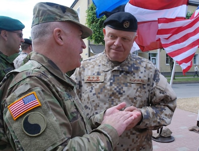 Brig. Gen. Blake C. Ortner, commanding general of the Virginia National Guard’s 29th Infantry Division and exercise director of Saber Strike 16, speaks with Lt. Gen. Raimonds Graube, the Latvian Chief of Defence, June 9, 2016, in Valka-Valga, a border town between Latvia and Estonia.