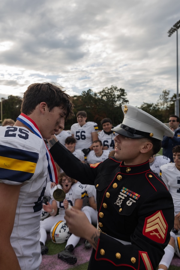 U.S. Marines with Recruiting Substation Hicksville, Recruiting Station New York, attend a Great American Rivalry Series (GARS) game between Farmingdale High School and Massapequa High School in Farmingdale, New York on October 21, 2023. GARS is hosted by Brainbox Intelligent Marketing and recognizes top high school football rivalries across the nation. (U.S. Marine Corps photo by Cpl. Jerry Edlin)