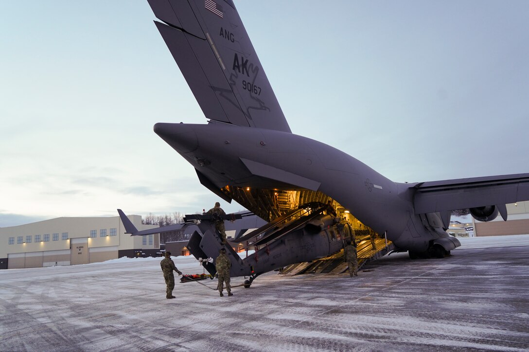 Airmen from the Alaska Air National Guard 176th Aircraft Maintenance from Joint Base Elmendorf-Richardson, Alaska, and the active duty 718th Aircraft Maintenance Squadron from Kadena Air Base, Japan, conducted a joint operation to transport an HH-60G Pave Hawk helicopter from Bethel to JBER in early January 2024.