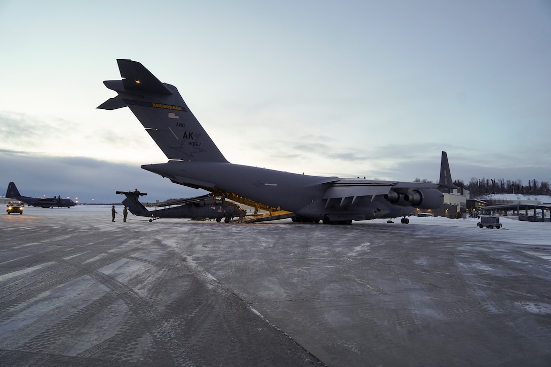 Airmen from the Alaska Air National Guard 176th Aircraft Maintenance from Joint Base Elmendorf-Richardson, Alaska, and the active duty 718th Aircraft Maintenance Squadron from Kadena Air Base, Japan, conducted a joint operation to transport an HH-60G Pave Hawk helicopter from Bethel to JBER in early January 2024.