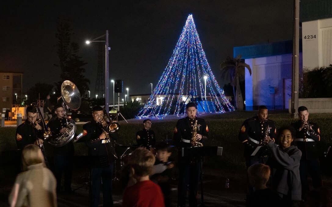 The III Marine Expeditionary Force Brass Band performed for the tree lighting ceremonies all across Okinawa, kicking off the holiday season right with Santa, his elves, and the gift of music.