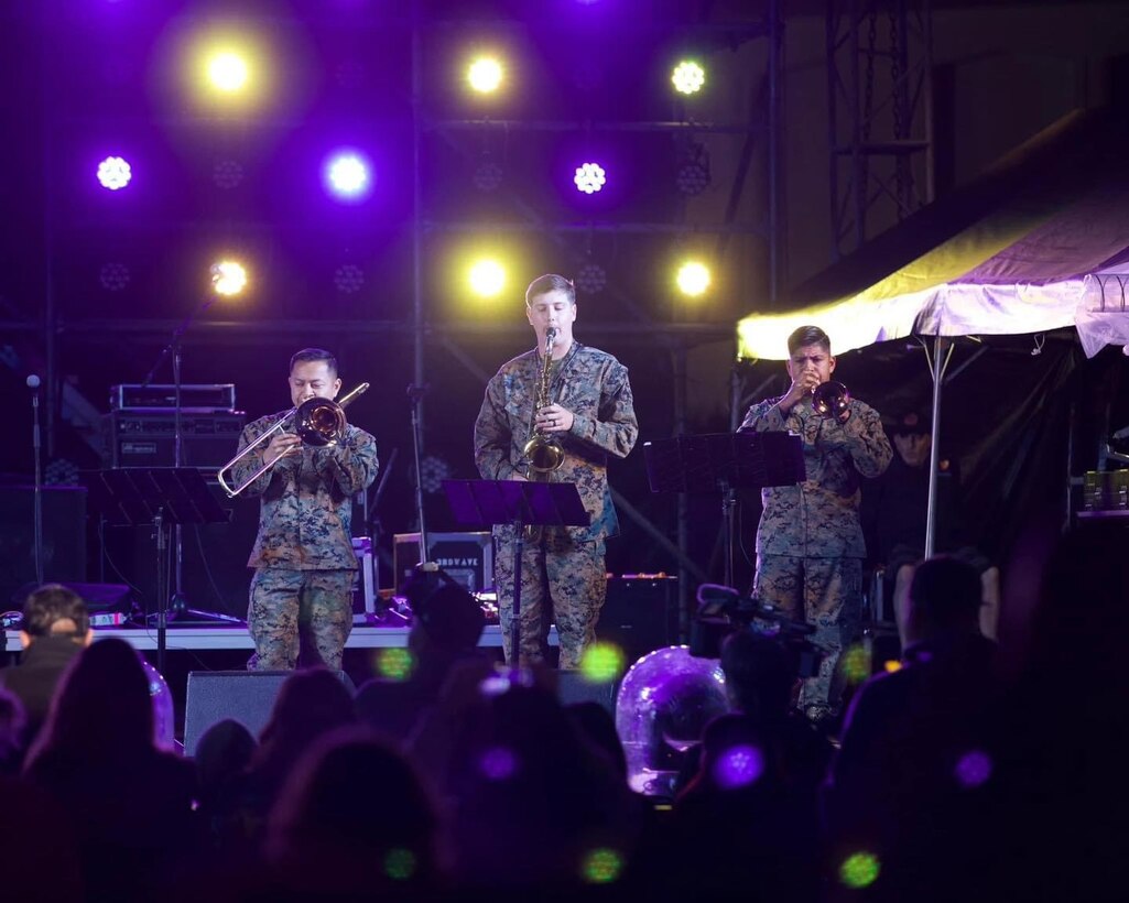 The III Marine Expeditionary Force Band Popular Music Group performed at Tinsel Town in celebration of the holiday season. This was one of several events leading up to the end of the year that Marines, their families, and the community were able to gather to celebrate the holidays and another successful year.