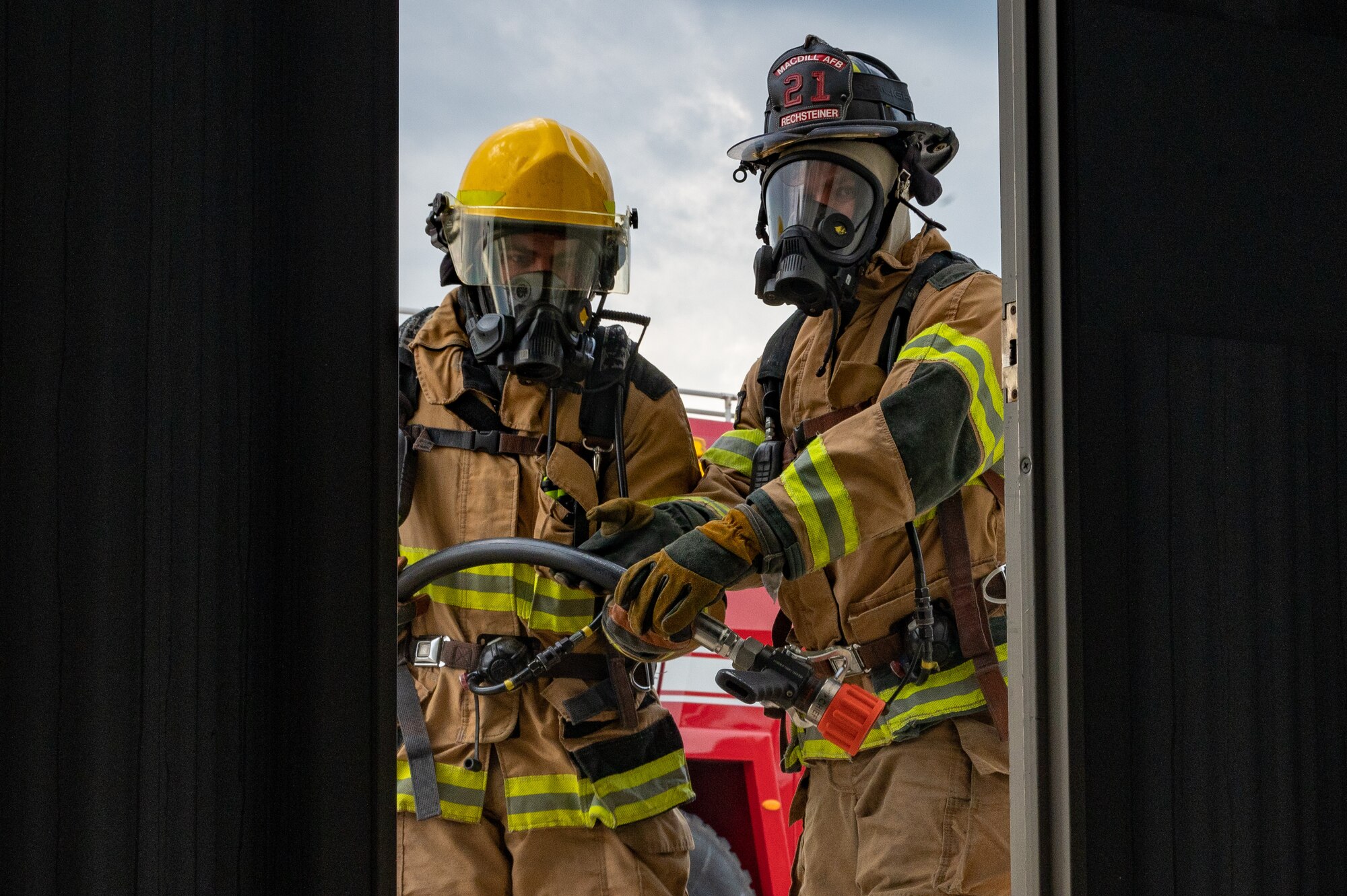 Firefighters from the 6th Civil Engineering Squadron participate in rapid intervention training at MacDill Force Base, Florida, Jan. 11, 2024.