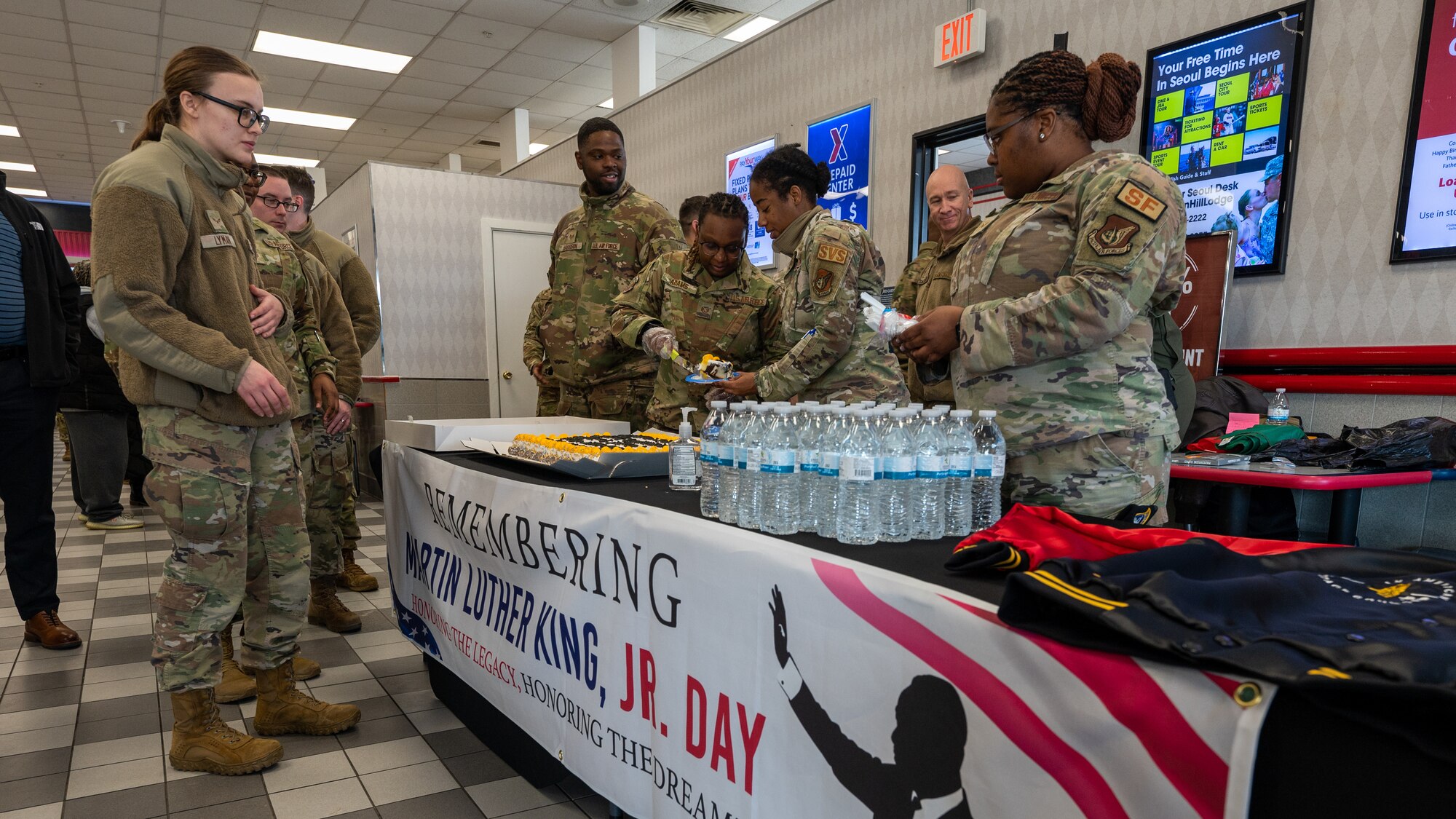 African American Heritage Council out cake to members of the Wolf Pack during a celebration of Martin Luther King Jr.