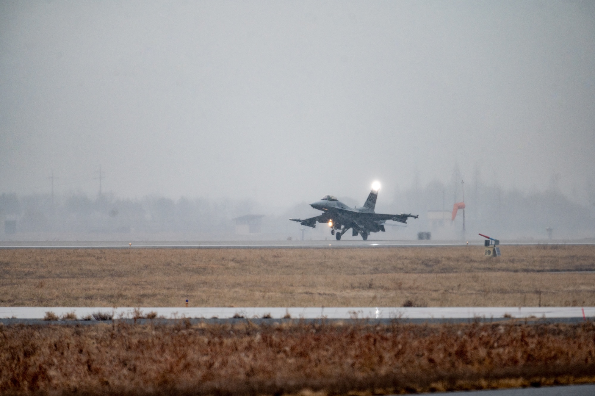 A U.S. Air Force F-16 Fighting Falcon lands at Osan Air Base, Republic of Korea, Jan. 9, 2024. The 36th Fighter Squadron conducts regular training during every day operations ensuring that the F-16s and pilots are ready to fly at all times to carry out the “Fight Tonight” mission. (U.S. Air Force photo by Airman 1st Class Chase Verzaal)