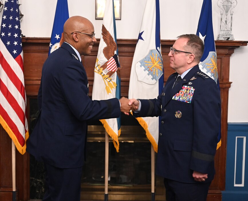 Chairman of the Joint Chiefs of Staff Gen. CQ Brown, Jr. congratulates newly appointed Air Force Vice Chief of Staff Gen. James Slife