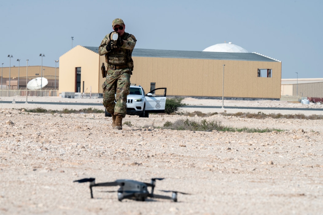 U.S. Air Force Staff Sgt. Kyle Schrader, a Security Forces installation patrolman, uses a Dronebuster