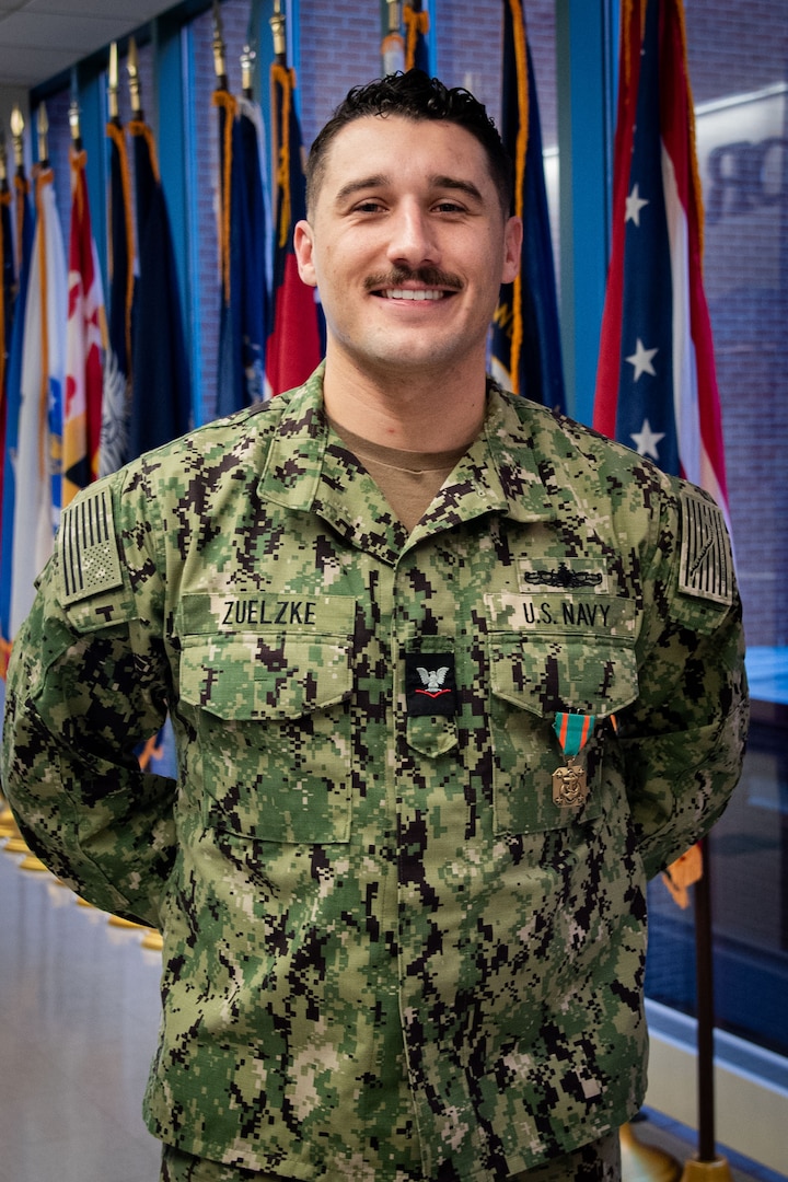 Hospital Corpsman Third Class Colin Zuelzke received the Navy and Marine Corps Commendation Medal on Thursday, January 11 in recognition of his service aboard Naval Health Clinic Cherry Point’s Patient Centered Medical Home.