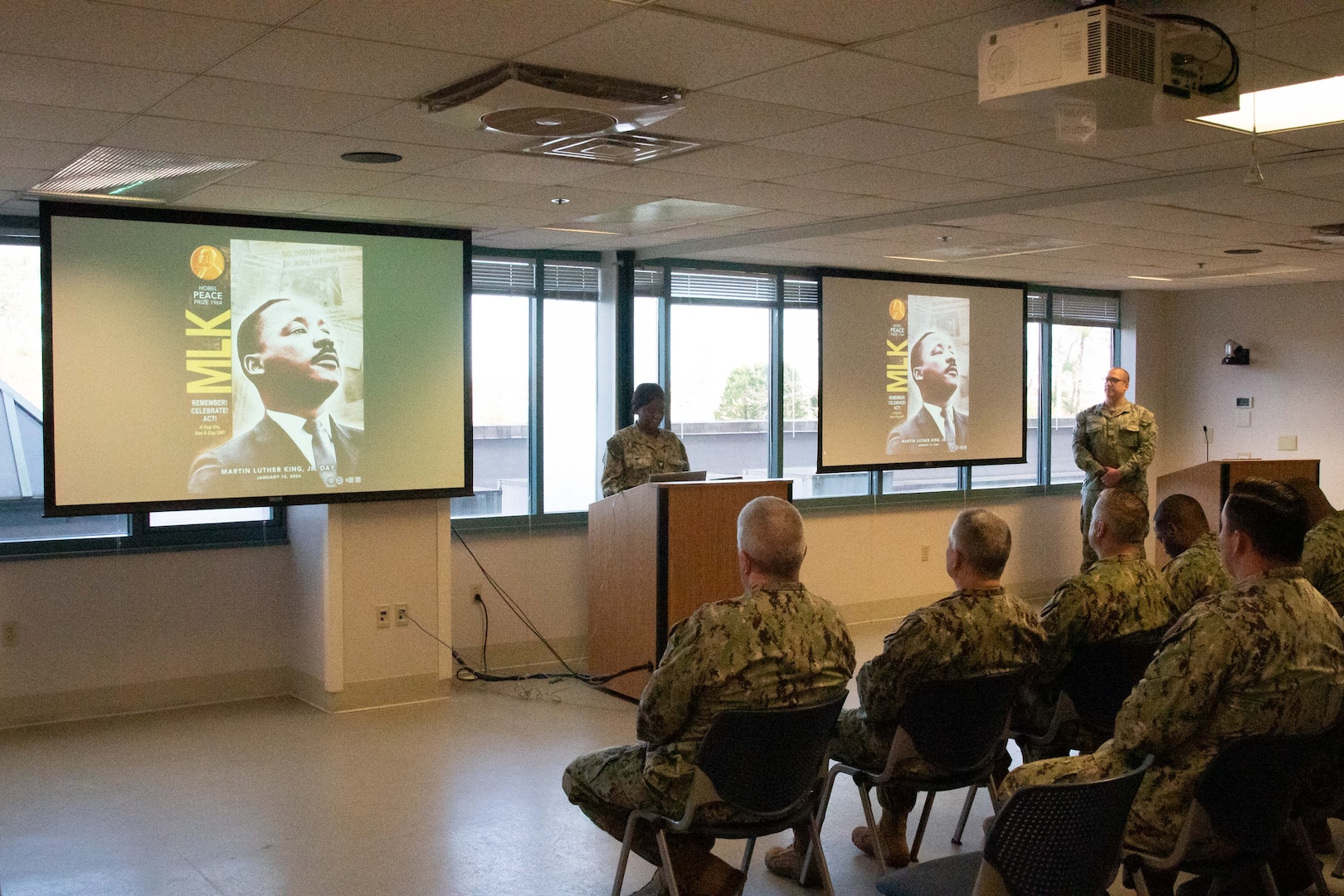 A Sailor serving aboard Naval Health Clinic Cherry Point reads a portion of the “I Have a Dream” speech during a special observance held Thursday, January 11 celebrating the life and legacy of Martin Luther King Jr.