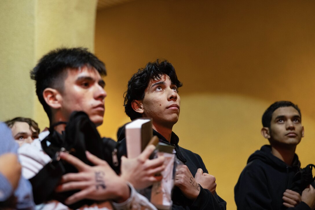 U.S. Marine Corps recruits with Hotel Company, 2nd Recruit Training Battalion, receive a brief during receiving at Marine Corps Recruit Depot San Diego, Jan. 8, 2024. During the receiving process, recruits are checked for contraband, given a haircut, makes a phone call home, and issued gear. (U.S. Marine Corps photo by Lance Cpl. Alexandra M. Earl)