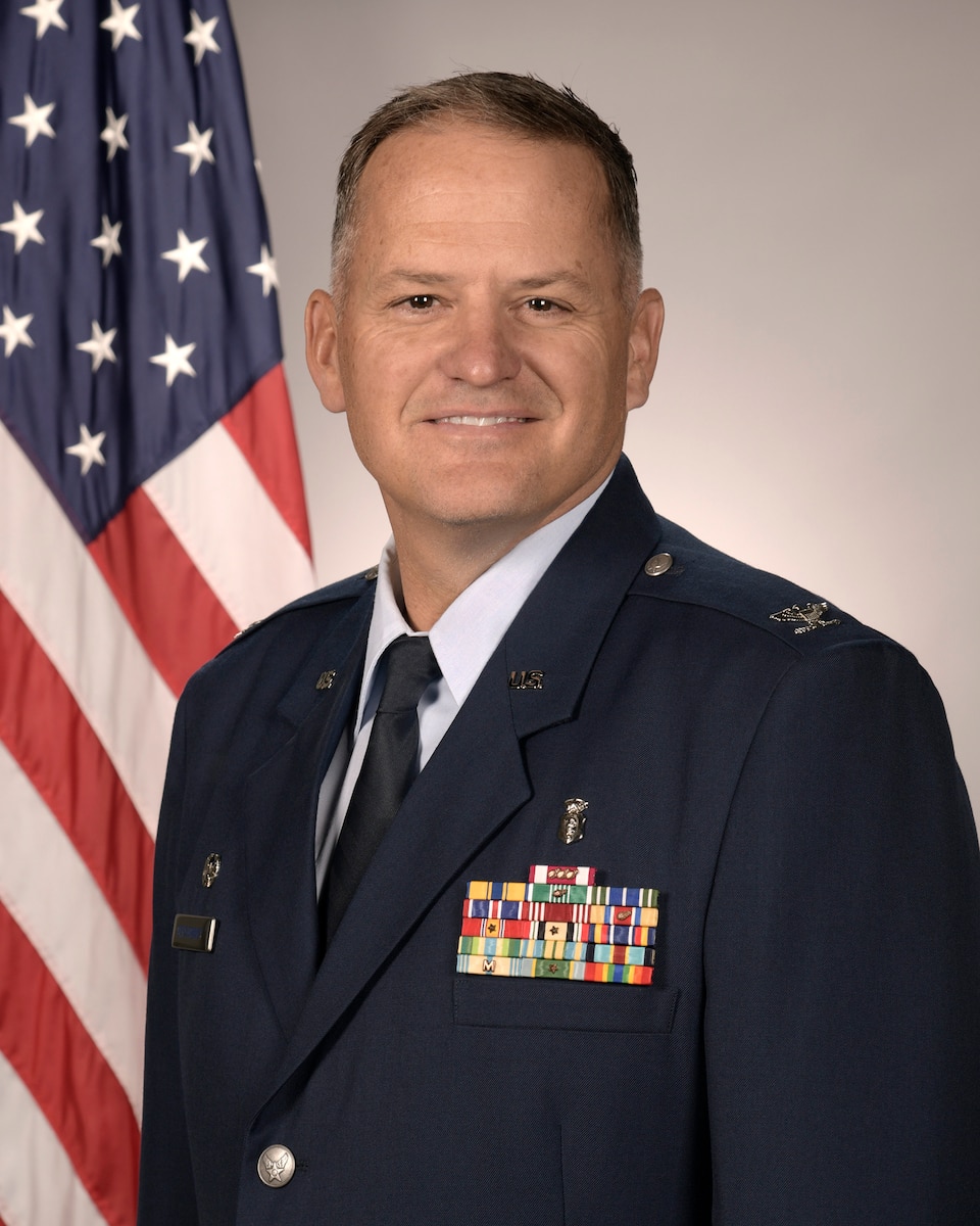 Col. James M. Bershinky, 433rd Medical Group commander, poses for an official photograph.