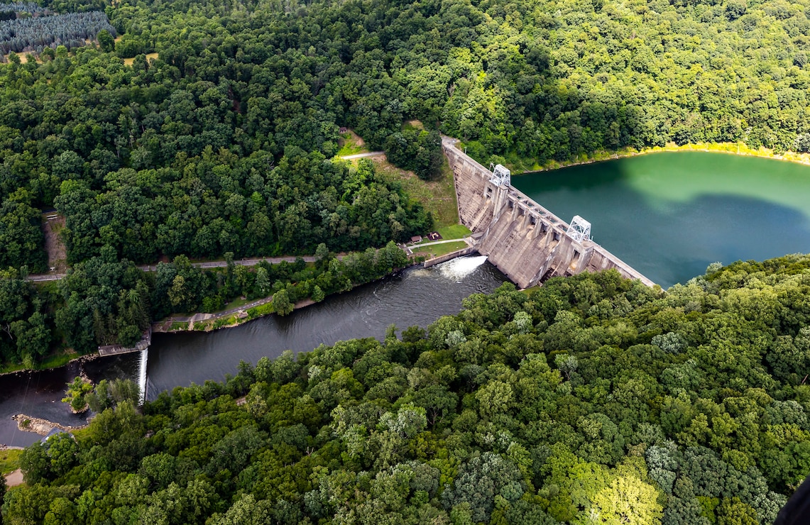 The photo above is an aerial view of Mahoning Creek Lake dam in Dayton, Pennsylvania, July 21, 2023. Mahoning Creek Lake is one of 16 flood risk reduction projects in the Pittsburgh District. Mahoning provides flood protection for the lower Allegheny and upper Ohio rivers. The U.S. Army Corps of Engineers started constructing Mahoning in 1939 and completed in June 1941, becoming fully operational the same month.

Pittsburgh District’s 26,000 square miles include portions of western Pennsylvania, northern West Virginia, eastern Ohio, western Maryland, and southwestern New York. It has more than 328 miles of navigable waterways, 23 navigation locks and dams, 16 multi-purpose flood-control reservoirs, 42 local flood-protection projects, and other projects to protect and enhance the nation’s water resources infrastructure and environment.

(U.S. Army Corps of Engineers Pittsburgh District photo by Michel Sauret)
