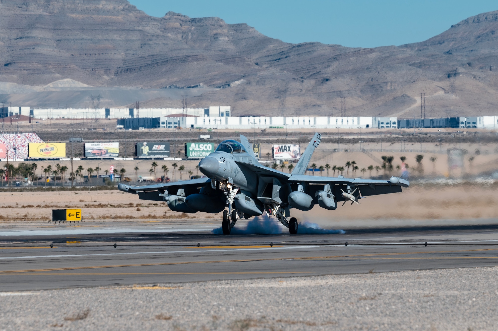 A U.S. Navy EA-18G Growler assigned to Naval Air Station Whidbey Island, Washington, arrives for Red Flag-Nellis 24-1