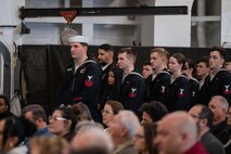 A photo of several people in formation.