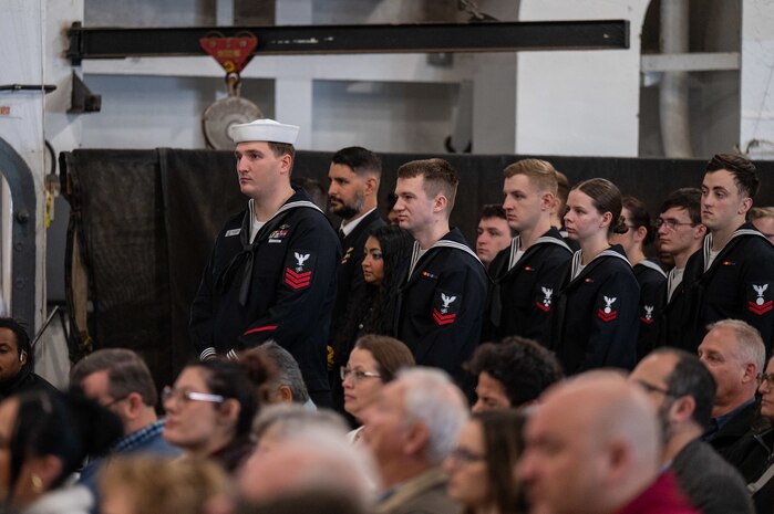 A photo of several people in formation.