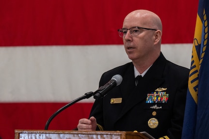 A photo of a man at a podium.