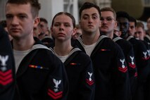 A photo of several people in formation.