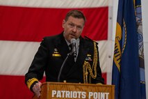 A photo of a man at a podium.