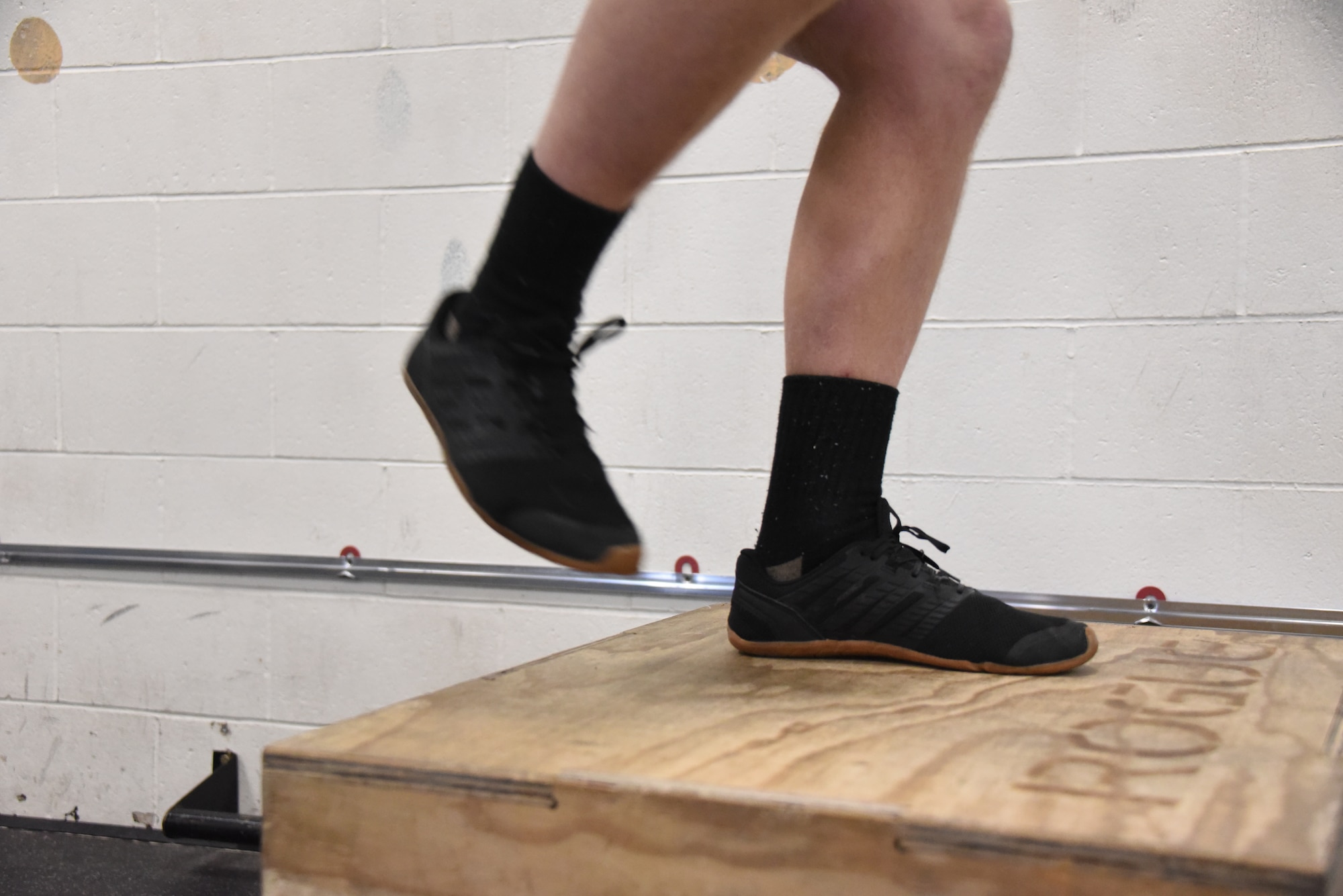 U.S. Air National Guard Technical Sgt. Devon Parr, a 185th Air Refueling Wing aerospace propulsion technician, performs a box jump