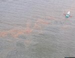 A skimmer vessel operates off the coast of Louisiana on January 11, 2024.