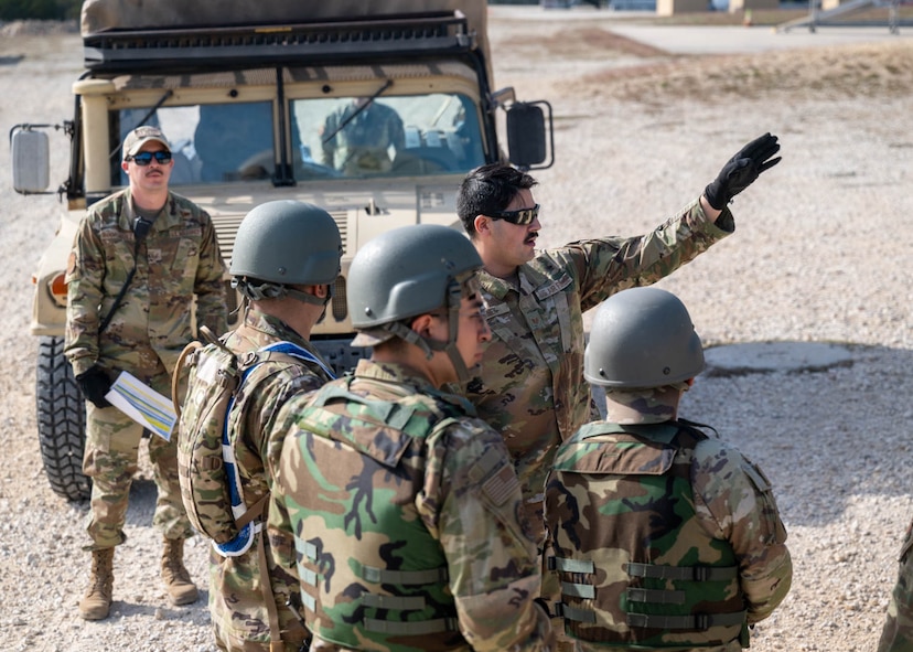 Airmen direct transferring simulated patients on Dec. 6, 2023, at Joint Base San Antonio-Camp Bullis, Texas, during Operation AGILE Medic. This joint force medical training exercise immerses medics in the seamless process of transporting patients from the Expeditionary Medical Support unit to the En Route Patient Staging System team, and onwards to Air Evacuation and Critical Care Air Transport Teams, and vice versa. The hands-on experience ensures medics gain a comprehensive understanding of communication protocols, the critical timing for patient preparation, and the intricacies of the entire process. (U.S. Air Force photo by Senior Airman Melody Bordeaux)