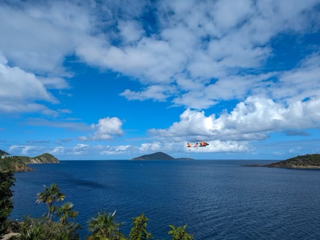 A Coast Guard MH-60T Jayhawk aircrew searches for a missing boater off Coki Beach in St. Thomas, U.S. Virgin Islands, Jan. 14, 2024. The missing boater is Todman Davaughn, 51, who reportedly was ejected from a 30-foot white power boat after the vessel crashed and spun out of control several times. (U.S. Coast Guard Photo by Petty Officer 1st Class Paul Sanders)