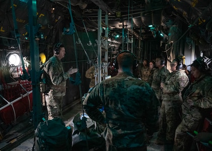 Airmen in the Critical Care Air Transport Team discuss patient care on Dec. 6, 2023, at Joint Base San Antonio-Camp Bullis, Texas, during Operation AGILE Medic. This joint force medical training exercise immerses medics in the seamless process of transporting patients from the Expeditionary Medical Support unit to the En Route Patient Staging System team, and onwards to Air Evacuation and Critical Care Air Transport Teams, and vice versa. The hands-on experience ensures medics gain a comprehensive understanding of communication protocols, the critical timing for patient preparation, and the intricacies of the entire process. (U.S. Air Force photo by Senior Airman Melody Bordeaux)
