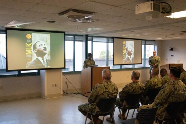 A Sailor serving aboard Naval Health Clinic Cherry Point reads a portion of the “I Have a Dream” speech during a special observance held Thursday, January 11 celebrating the life and legacy of Martin Luther King Jr.