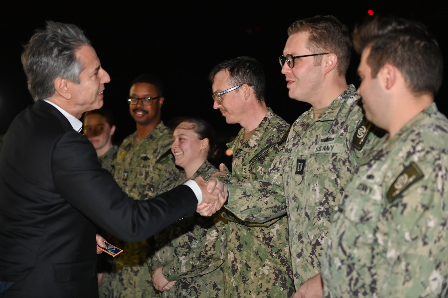 Lt. Joshua Korver, training officer, assigned to Naval Support Activity Souda Bay, shakes hands with Secretary of State Antony Blinken before his departure from Greece, Jan. 6, 2024.