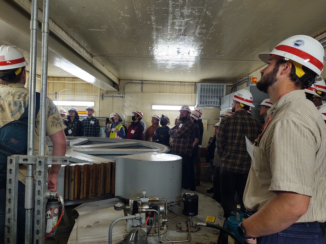 Army Fellows touring the navigation lock miter gate machinery at The Dalles Project.
