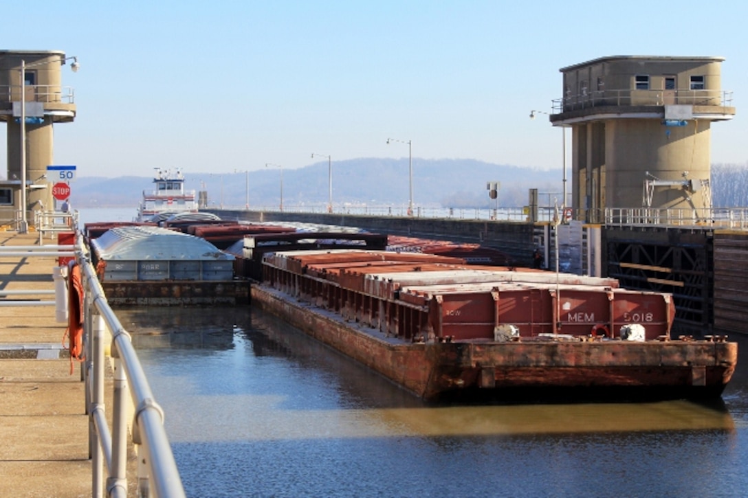 A barge locking through at Cannelton Locks and Dam in Cannelton, Indiana.