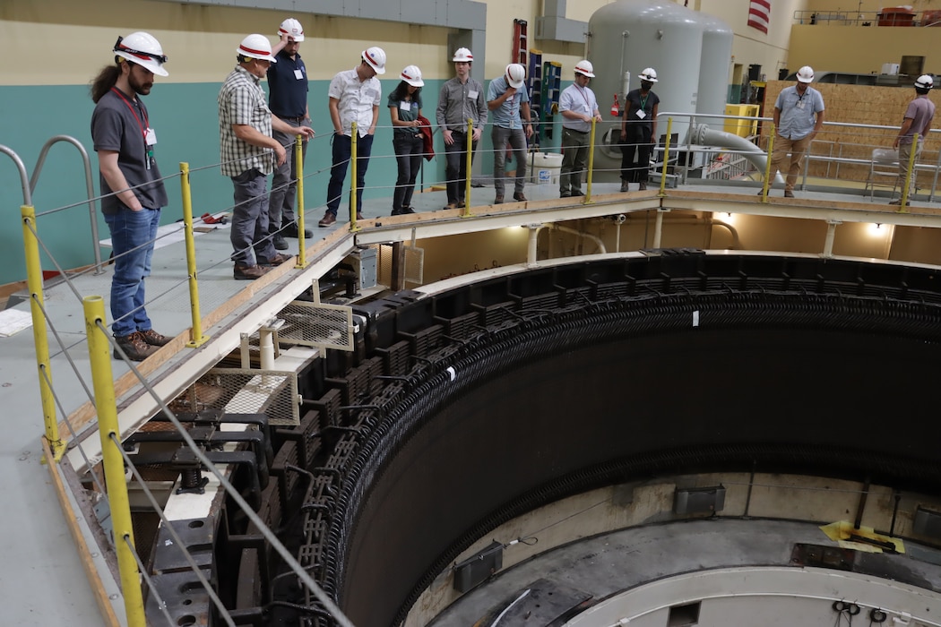 Army Fellows viewing stator for Unit 1 at Ice Harbor Project.