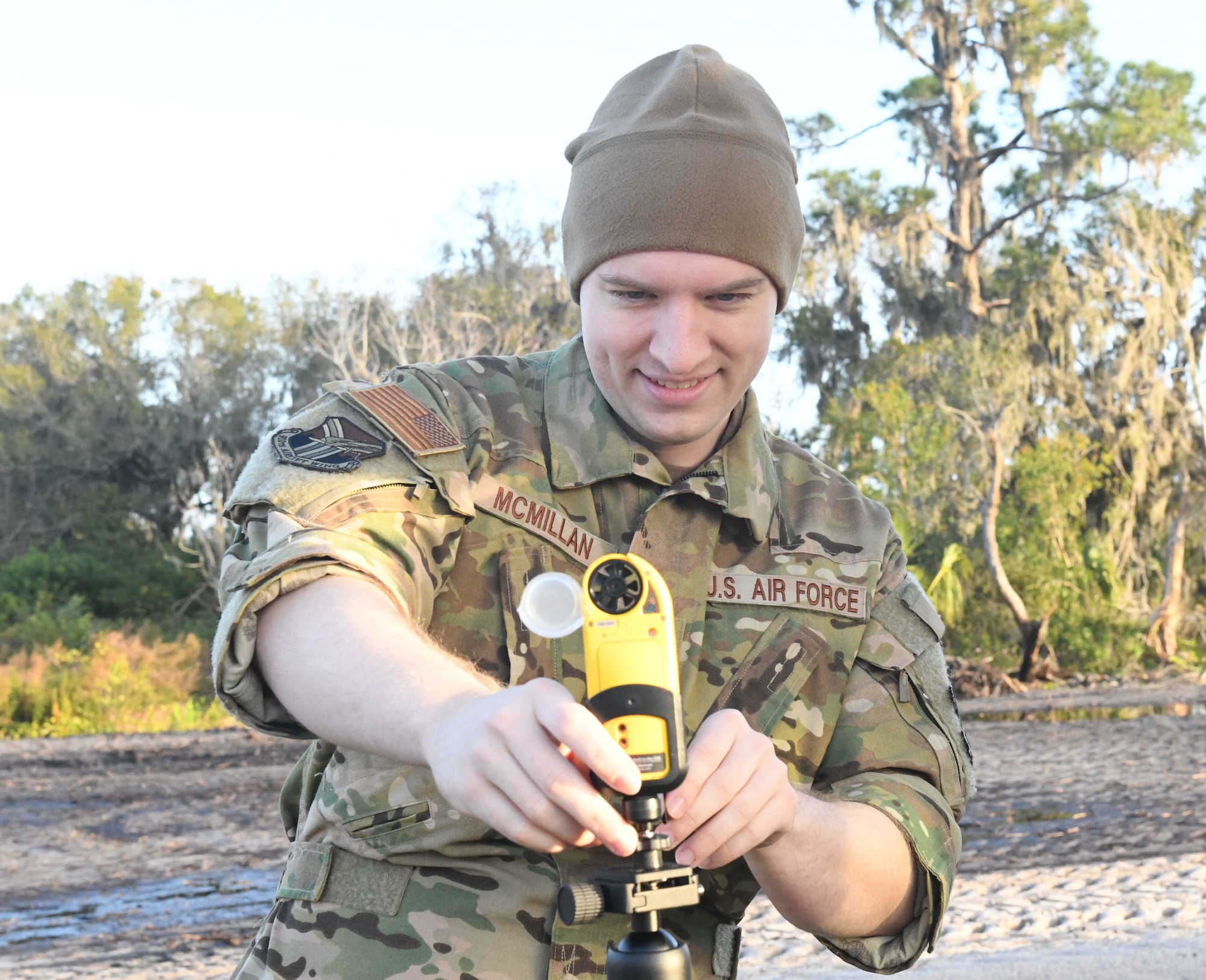 Capt. Benjamin McMillan, medical entomologist assigned to the 757th Airlift Squadron, checks the wind prior to the aerial demonstration as part of his first Department of Defense Category 11 Pesticide Applicator Training and Certification Course at Manatee County Mosquito Control District's Headquarters, Florida, on Jan. 10, 2024.