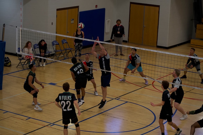U.S. Airmen play in a volleyball tournament at Davis-Monthan Air Force Base, Ariz., Jan. 13, 2024. Seven Air Force volleyball teams from the west coast traveled to Davis-Monthan to compete in the two day tournament. (U.S. Air Force photo by Airman 1st Class Robert Allen Cooke III)