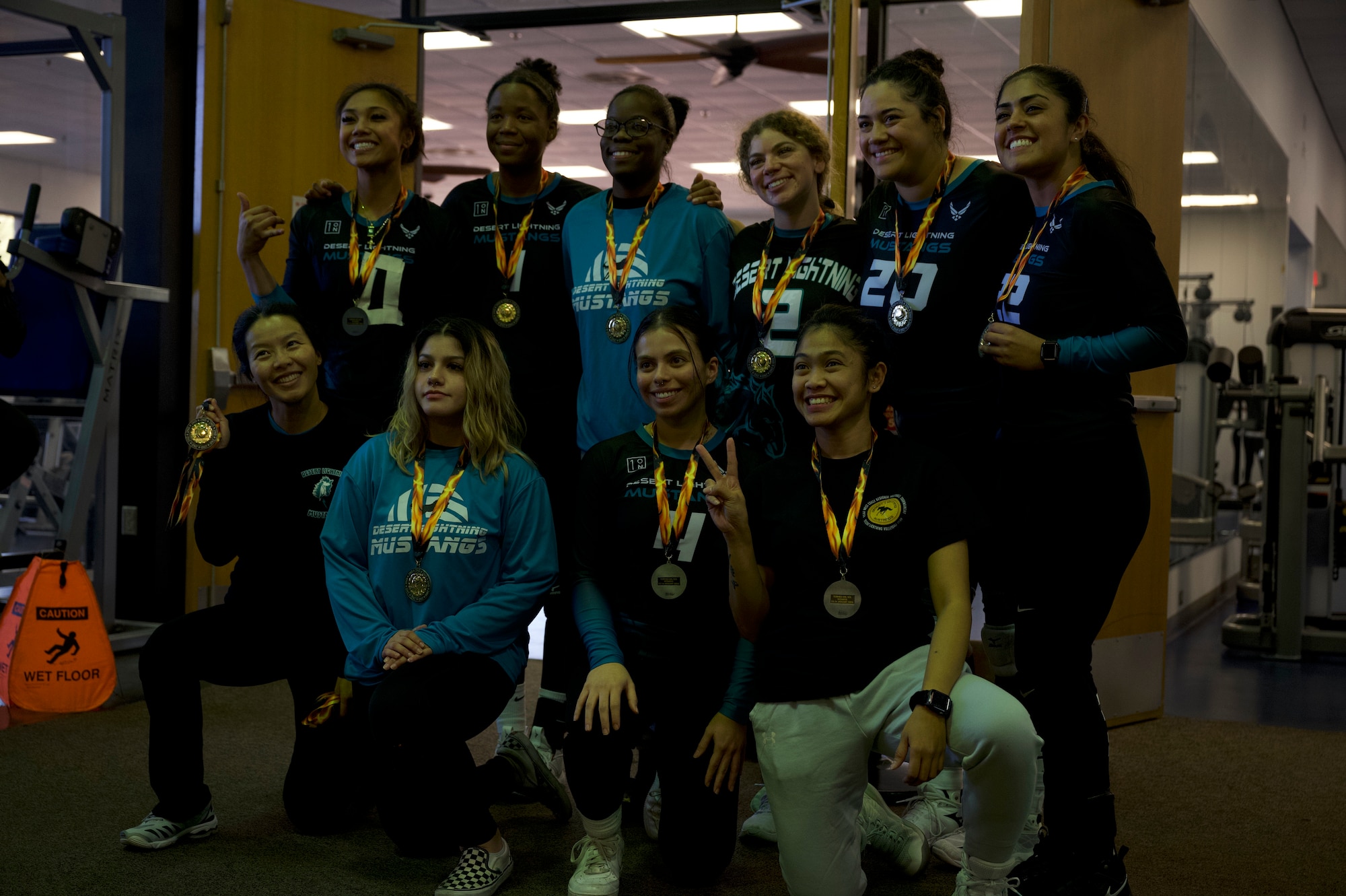 U.S. Airmen on the women’s division of the Davis-Monthan Air Force Base volleyball team receive an award at Davis-Monthan Air Force Base, Ariz., Jan. 14, 2024. Davis-Monthan organized and hosted the regional volleyball tournament for U.S. Air Force teams on the west coast. (U.S. Air Force photo by Airman 1st Class Robert Allen Cooke III)