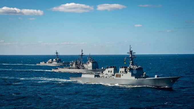 From right to left, the Sejong the Great-class guided-missile destroyer ROKS Sejong the Great (DDG-991) from the Republic of Korea Navy, the Ticonderoga-class guided-missile cruiser USS Princeton (CG 59), the Arleigh Burke-class guided-missile destroyer USS Kidd (DDG 100), sail together during a trilateral exercise, Jan. 16. The exercise allowed maritime forces from Japan, Republic of Korea, and U.S. to train together to enhance coordination on maritime domain awareness and other shared security interests. Vinson, flagship of Carrier Strike Group ONE, is deployed to the U.S. 7th Fleet area of operations in support of a free and open Indo-Pacific. (U.S. Navy photo by Mass Communication Specialist 2nd Class Isaiah B. Goessl)