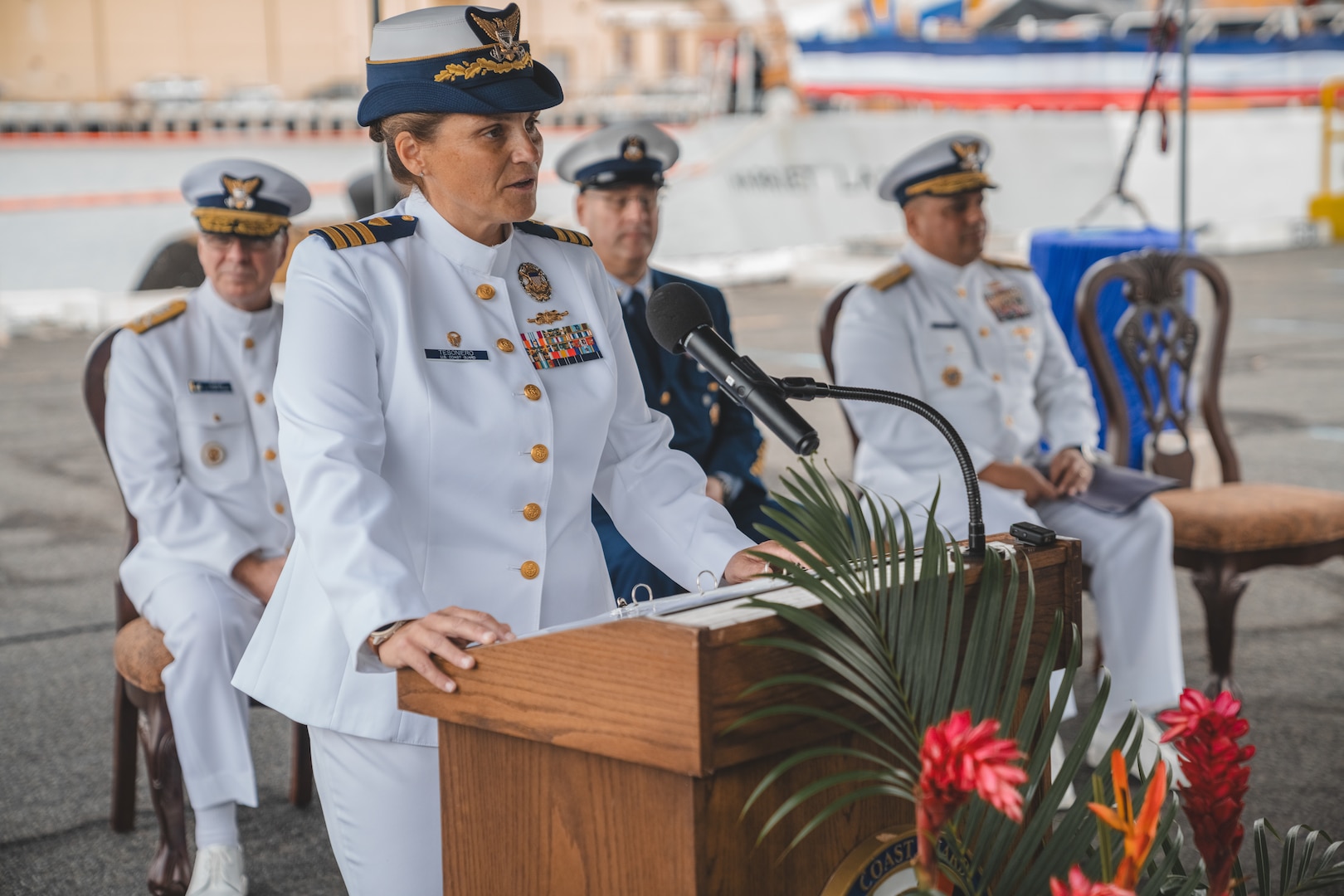 Cmdr. Nicole Tesoniero gives a speech during the Harriet Lane's (WMEC 903) change of home port ceremony at Joint Base Pearl Harbor Hickam, Jan. 16, 2024. Harriet Lane and crew recently transferred to Hawaii from its former home port in Portsmouth Virginia. (U.S. Coast Guard photo by Petty Officer 2nd Class Ty Robertson)