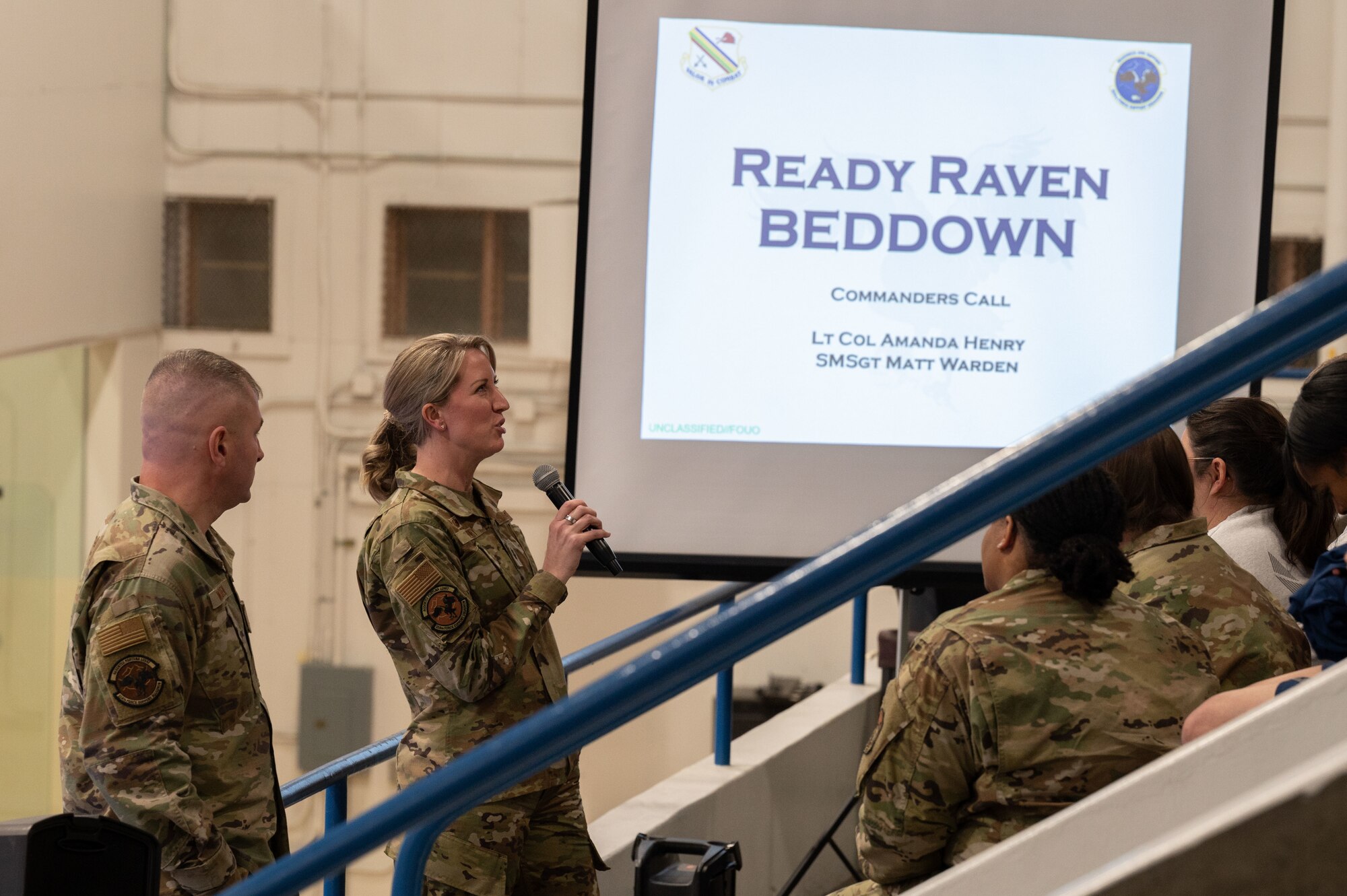 U.S. Air Force Lt. Col. Amanda Henry, 354th Force Support Squadron commander, briefs her team at the end of the first day of Raven Beddown 2024 on Eielson Air Force Base, Alaska, Jan. 6, 2024.
