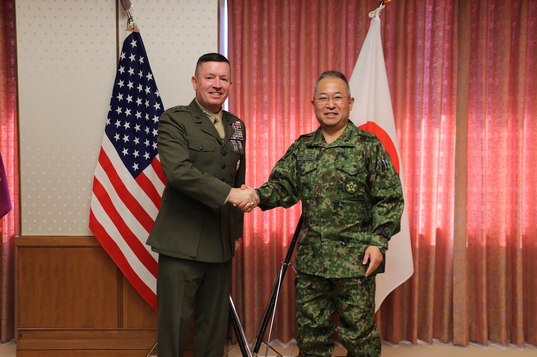 Lt. Gen. James Bierman shakes hands with Gen. Yoshida, Chief of Staff of the Japan Joint Staff, during an outcall at the Ministry of Defense, on 17 January. Lt. Gen. Bierman was appreciative of the outcall and the close bond shared between U.S. and Japanese leaders. (Courtesy Photo from the Japan Joint Staff)
