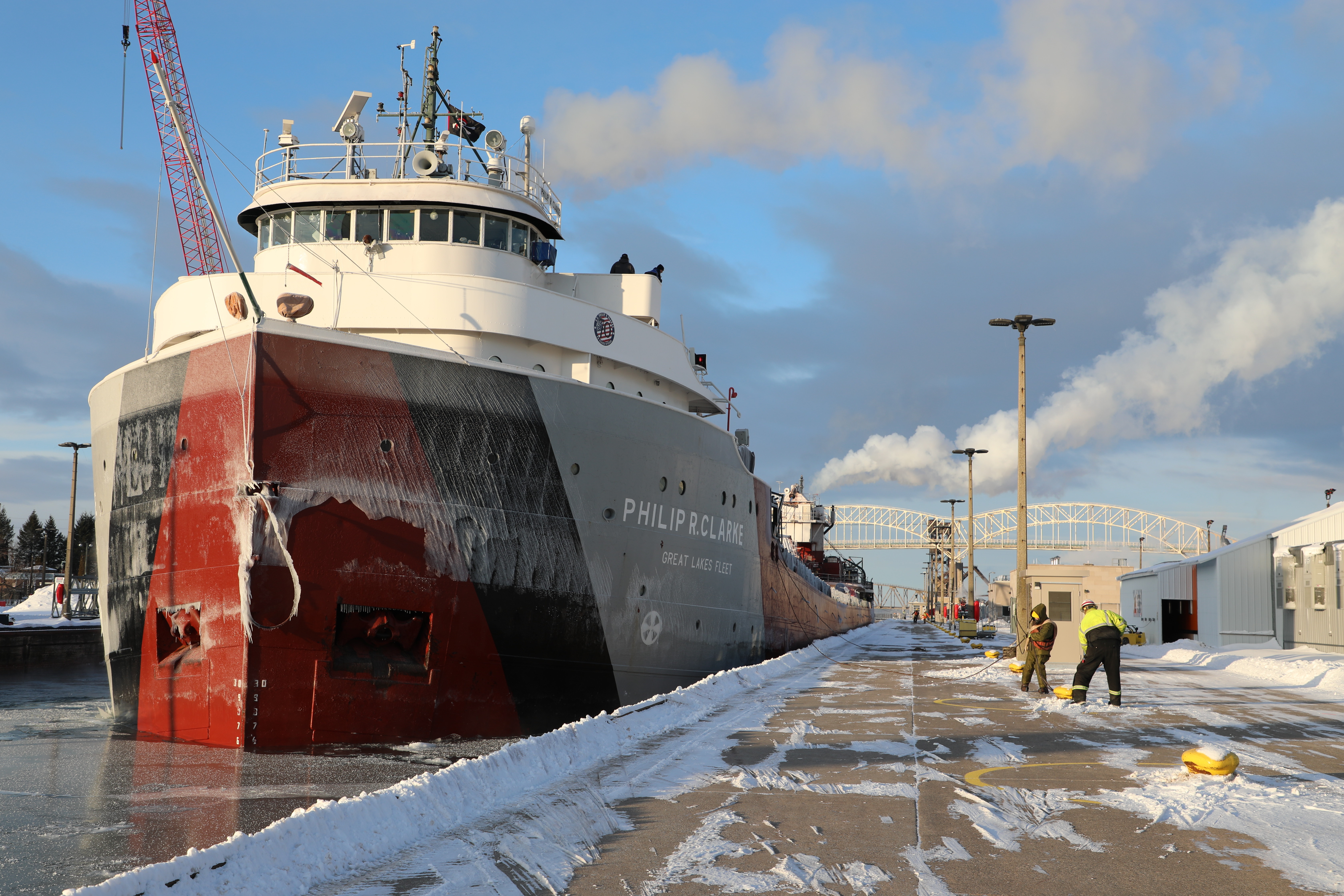Line handlers from the U.S. Army Corps of Engineers, Detroit District and the Philip R. Clarke moor the ship in the Poe Lock in Sault Ste. Marie, Mich. on Jan. 16, 2024. The Philip R. Clarke was the last ship through the Soo Locks for the 2023-2024 Great Lakes navigation season.