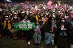 Supporters cheer for the Democratic Progressive Party during an elections rally in New Taipei City, Taiwan