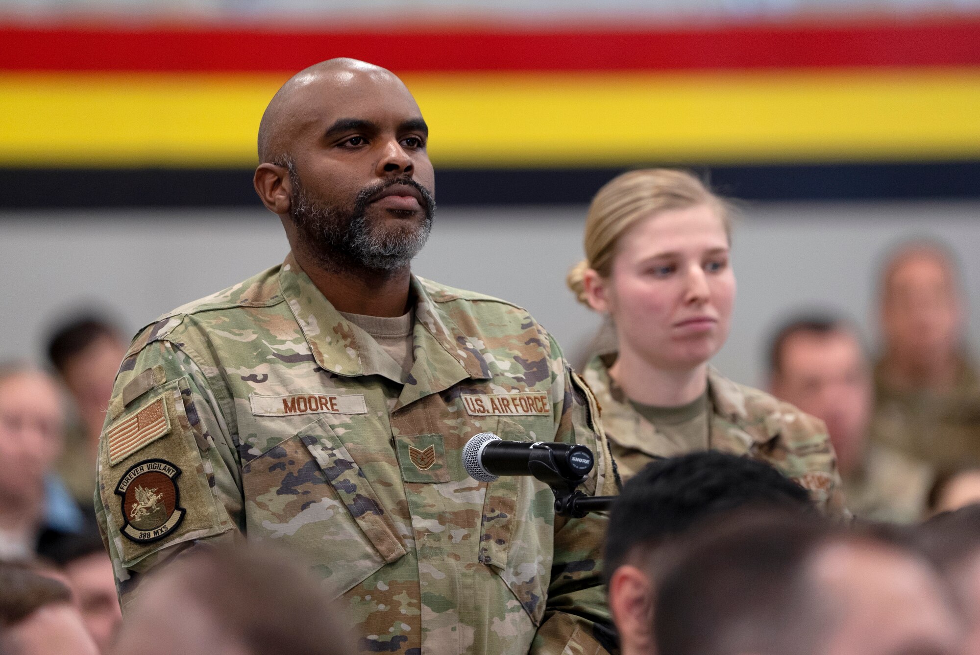 Tech. Sgt. Leslie Moore, 388th Maintenance Squadron, participates in a question-and-answer session during an all-call inside a hangar on Hill Air Force Base, Utah, Jan. 8, 2024.