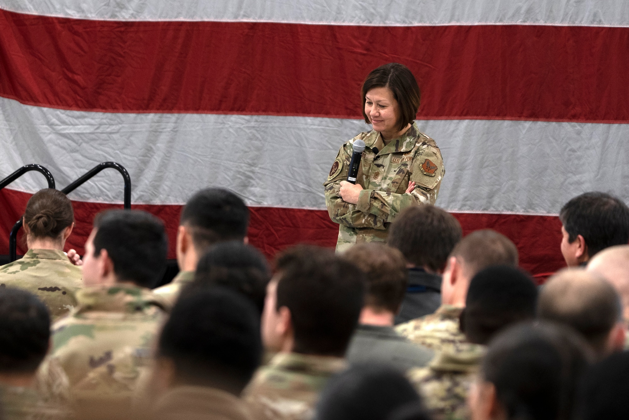 Chief Master Sgt. of the Air Force JoAnne S. Bass speaks at an all-call inside a hangar on Hill Air Force Base, Utah, Jan. 8, 2024.