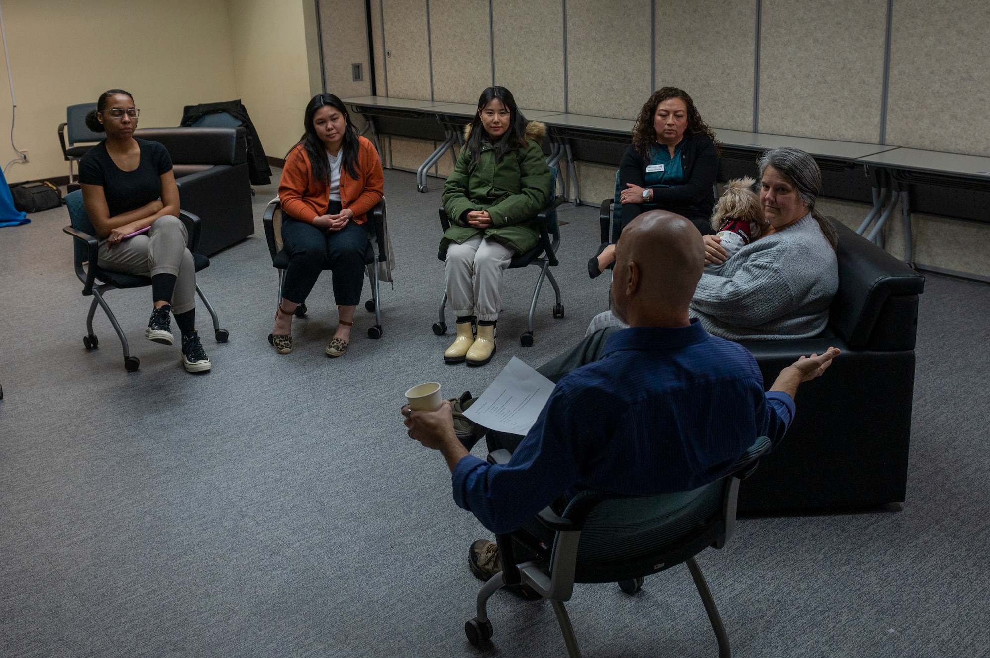 Community members gathered for a class at the Military Family & Readiness Center to learn how to cope with seasonal affective disorder at Osan Air Base, Republic of Korea, Jan. 11, 2024. The class, “Breathing through the blues”, was created as a safe space for individuals to share their experiences with how the weather or season affects them. (U.S. Air Force photo by Senior Airman Kaitlin Castillo)
