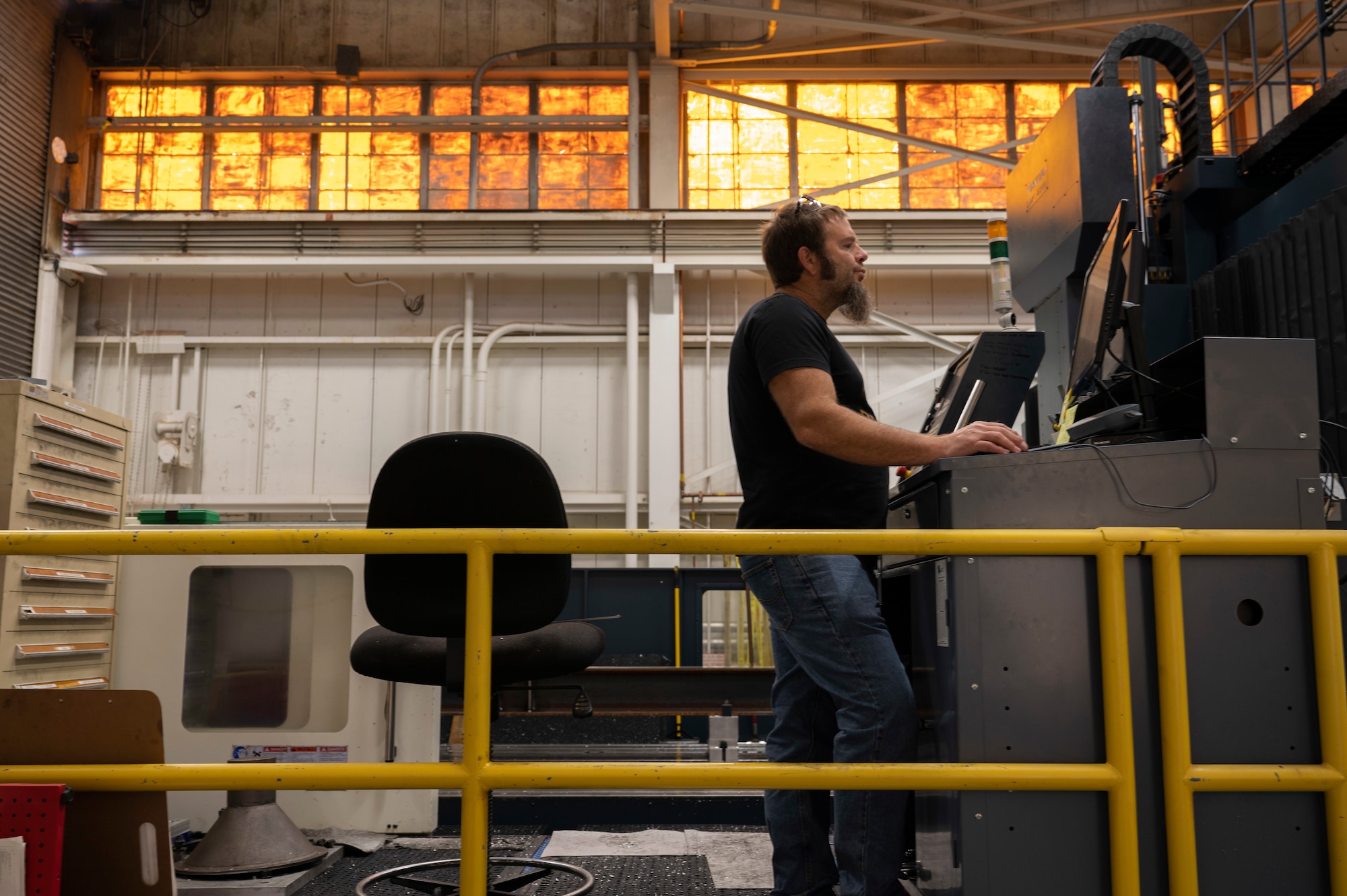 Adam Swallows, 846th Test Squadron machinist, operates a bridge mill machine to make slipper inserts for sleds that run on the test track at Holloman Air Force Base, New Mexico, Jan. 10, 2024. The bridge mill generates various assembly parts for sleds to run on the test track and helps contribute to the U.S. Air Force and other military branches. (U.S. Air Force photo by Airman 1st Class Michelle Ferrari)
