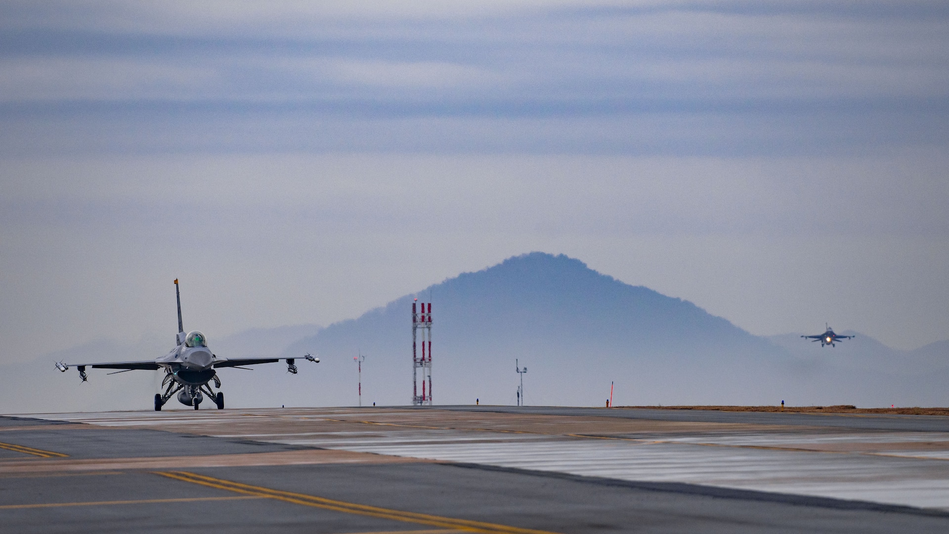 Two F-16 Fighting Falcons arrive at Kunsan Air Base.