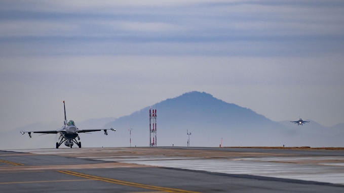 Two F-16 Fighting Falcons arrive at Kunsan Air Base.