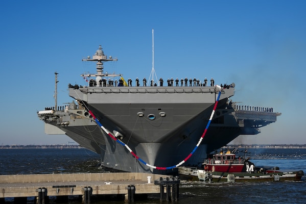 The Ford-class aircraft carrier USS Gerald R. Ford (CVN 78), along with the staff of carrier Strike Group (CSG) 12, return to Naval Station Norfolk following an eight-month deployment, Jan. 17, 2024. The Gerald R. Ford CSG was deployed to the U.S. Naval Forces Europe area of operations, employed by U.S. 6th Fleet to defend U.S., allied and partner interests. (U.S. Navy photo by Mass Communication Specialist 2nd Class Manvir Gill)